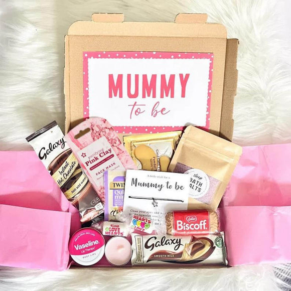 Overview photo of Mummy To Be Gift Box Pregnancy Hamper Maternity Gift Mum To Be Gift Hamper Mom To Be Baby Mother To Be Gift Box Gift For New Mum Hamper Gift New Baby Gift Mum To Be Gift everything laid out on pink tissue paper inside the box. Showing 